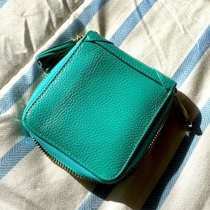 Teal leather RFID billfold.  Zip closure.  New